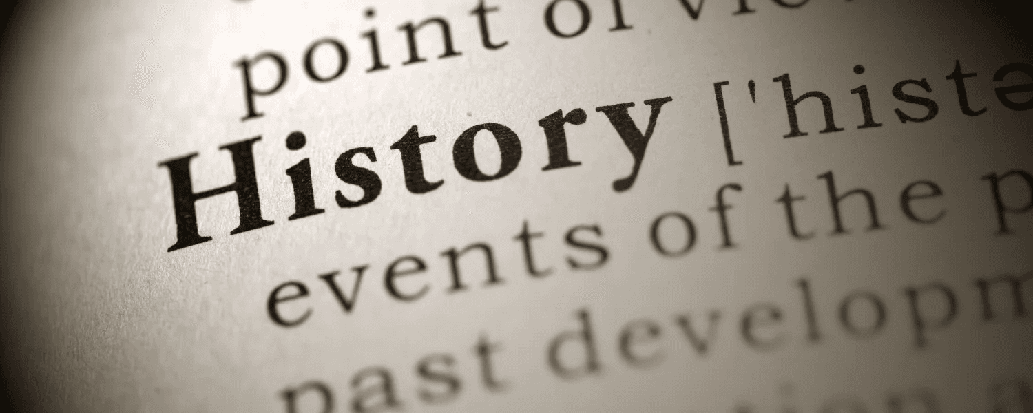 Close-up of the word "History" from a dictionary page.